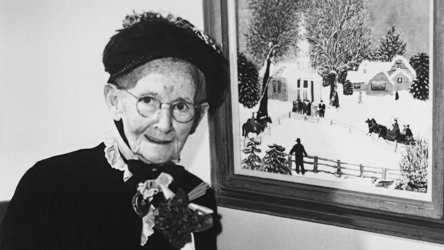Grandma-Moses next to a painting Grandma moses never too late